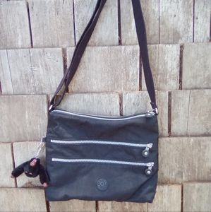 Kipling midnight blue crossbody bag with monkey charm